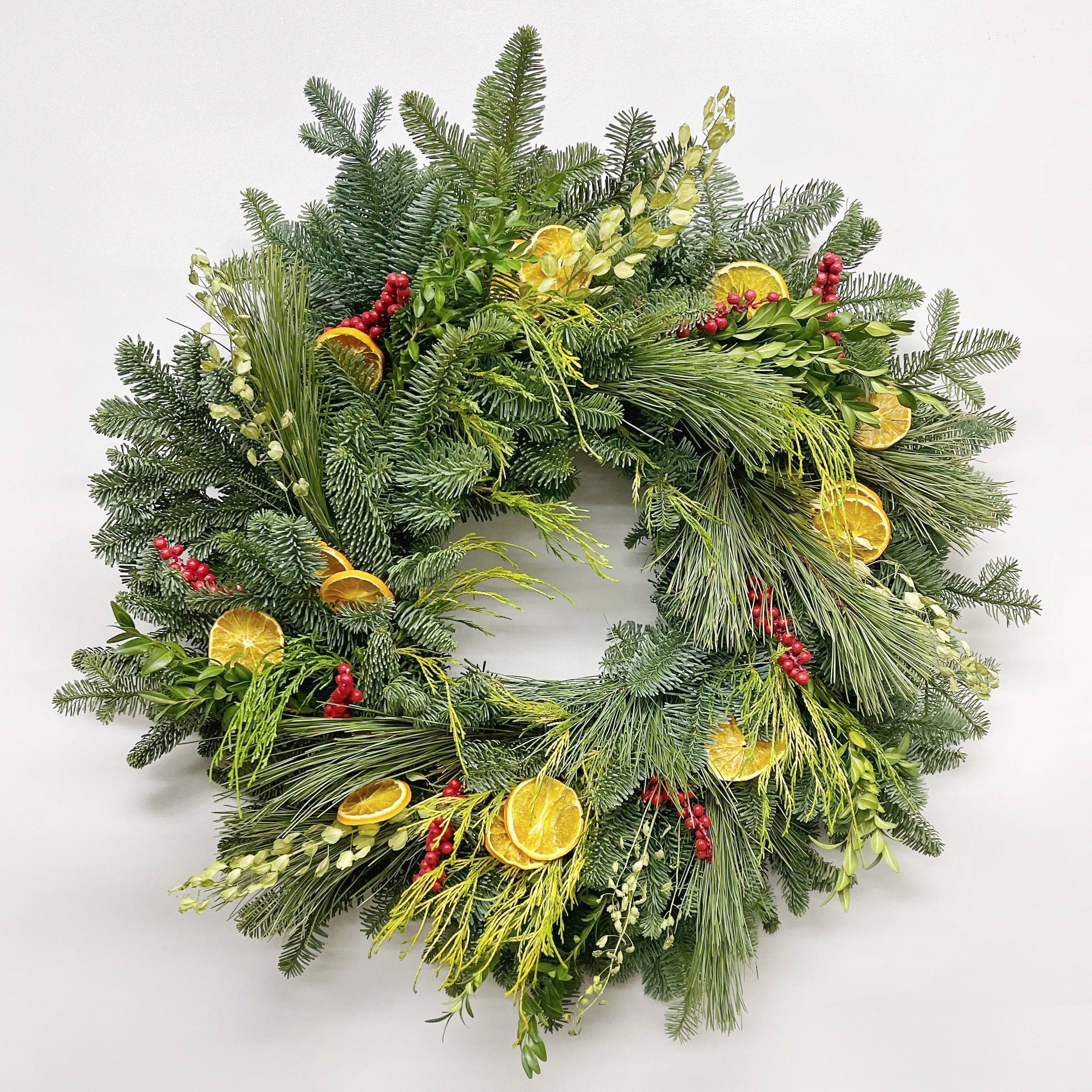 Berries and Branches Evergreen Wreath - Currans Flowers