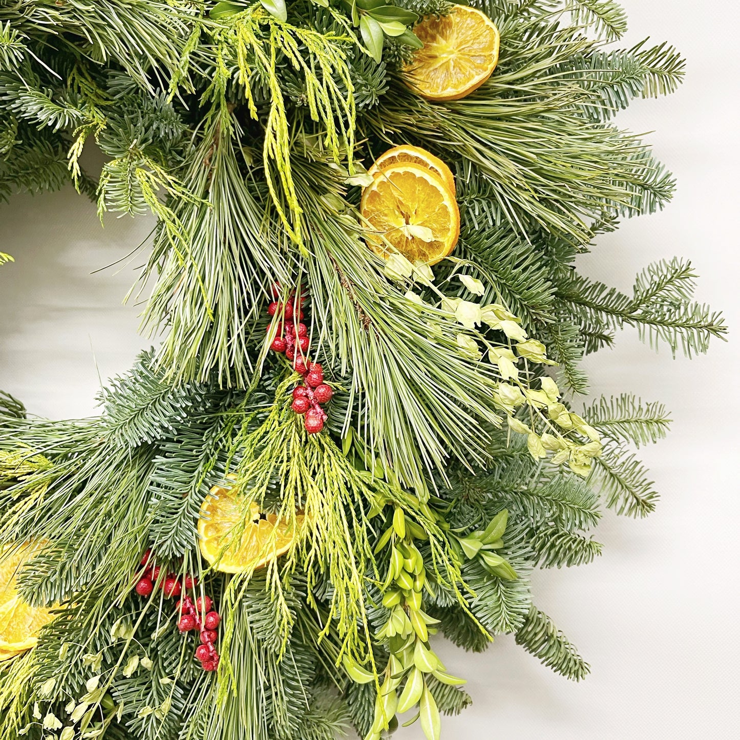 Fresh Evergreens Citrus and Berry Wreath