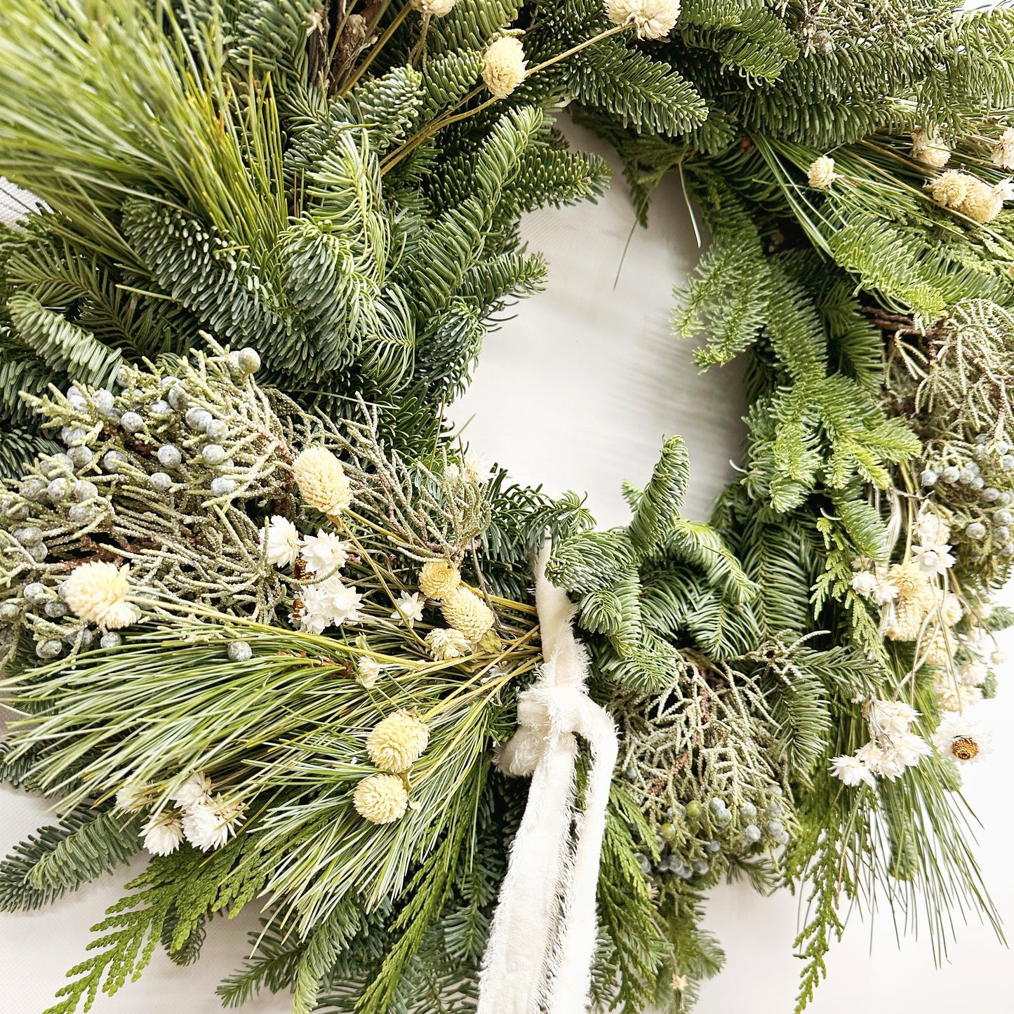 Fresh Evergreens and Ivory Draped Ribbon Wreath